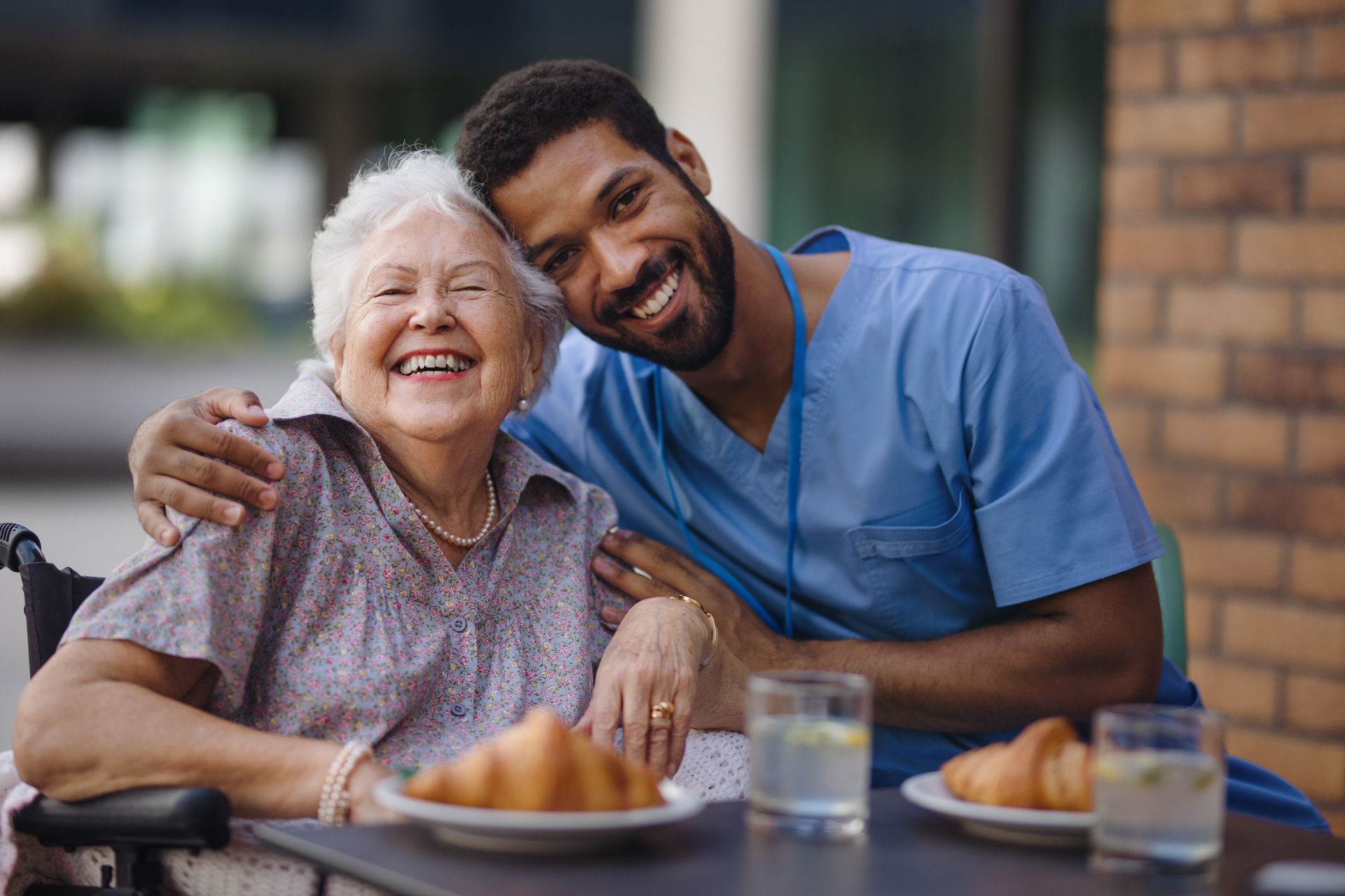 Caregiver providing compassionate aged care support
